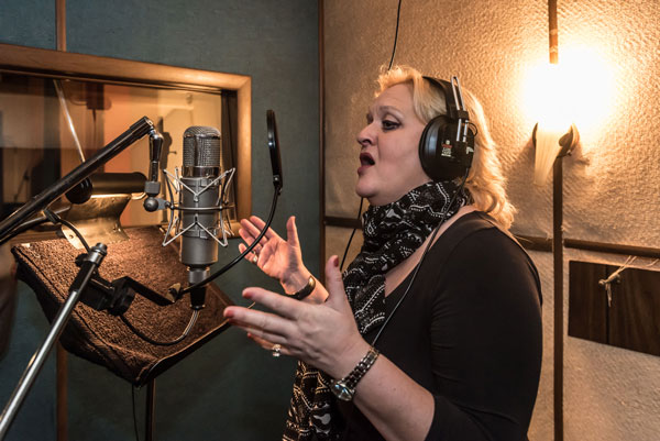 Emma in the vocal booth